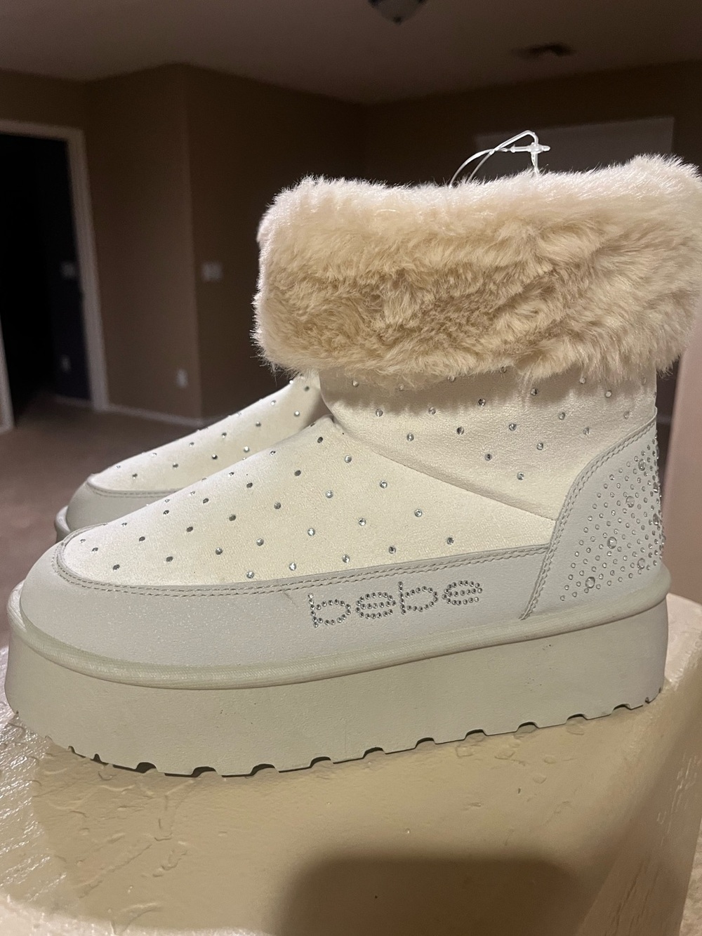 Bebe cream snow boots, size 7
